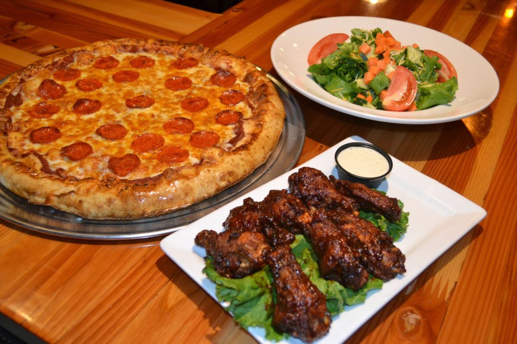 bachelor party food pizza, wings and salad